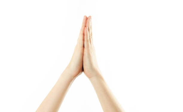 istock Close-up female tender hands on a white isolated background. Conventional labeling. 1084421908