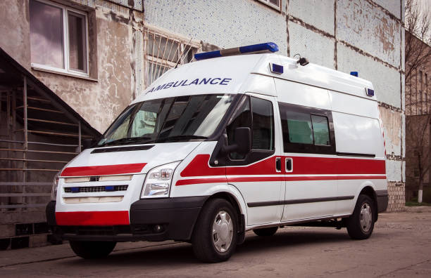 istock ambulance car on blured background. Ambulance auto paramedic emergency. 1084428236