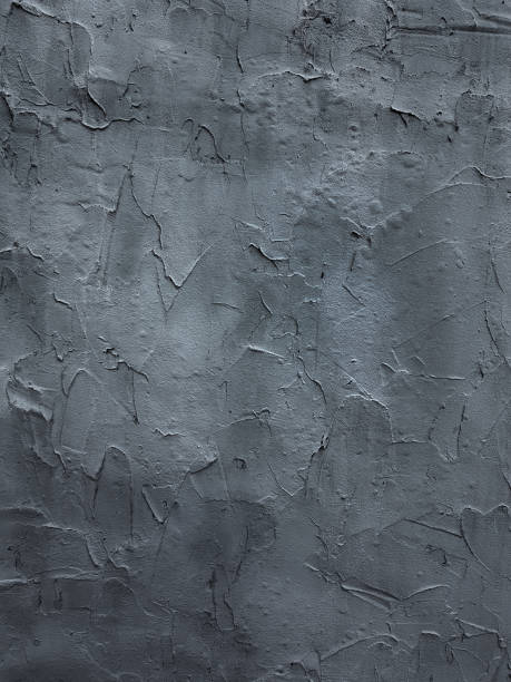 istock texture of rough putty on the wall. grunge background. 1084428410