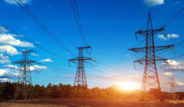 istock high-voltage  power lines at storm clouds. electricity distribution station. high voltage electric transmission tower. 1084428696