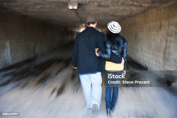 Couple In Tunnel Stock Photo - Download Image Now - 20-24 Years, 25-29 Years, Adult