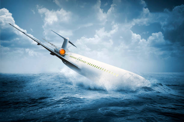 Falling plane accident crashing into the water Falling plane accident crashing into the water on the sea airplane crash stock pictures, royalty-free photos & images