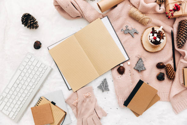 istock Blogger Christmas composition with decorations. Flat lay on white cozy background, copy space. Notebook, keyboard, holiday concept 1084436968
