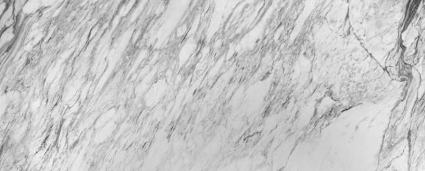 istock White marble wall or flooring pattern surface texture. Close-up of interior material for design decoration background 1084437850