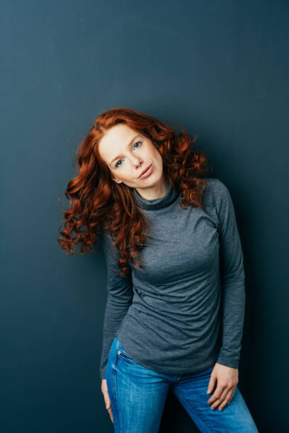 istock Serious intense young redhead woman 1084441074