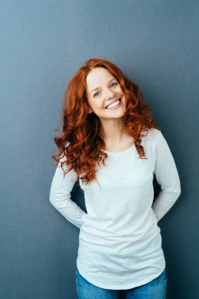 istock Happy friendly young woman with a lovely smile 1084441242