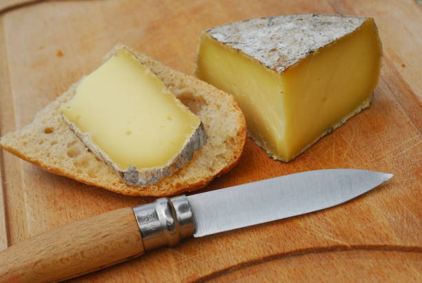 istock Piece of tomme bauges on bread 1084448476