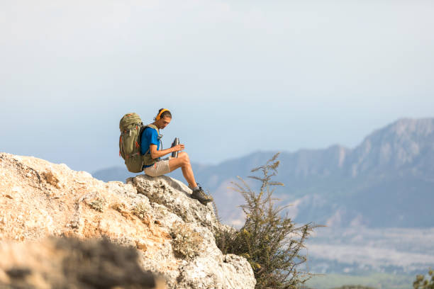 istock Hiker Relaxation in Mountains 1084449550