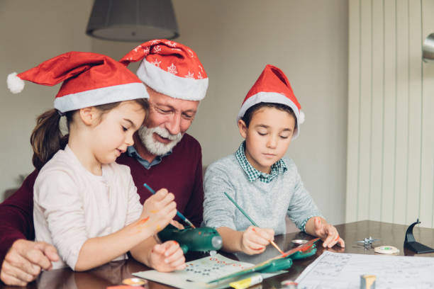 istock Family making a toy plane 1084456032