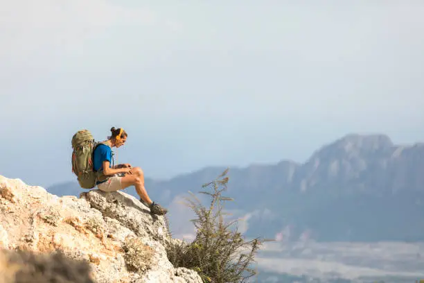 Photo of Hiker Relaxation in Mountains