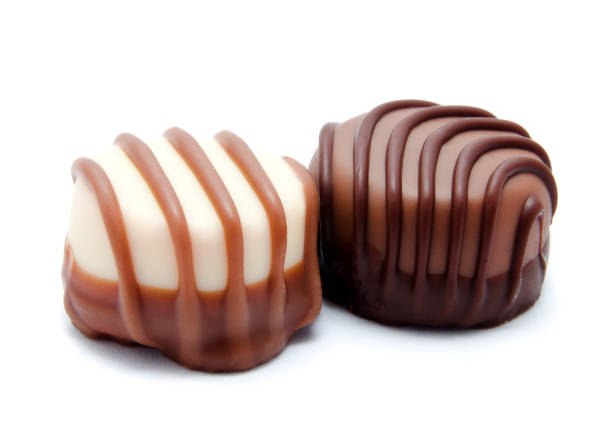 istock Assortment of chocolate candies sweets isolated on a white 1084459494