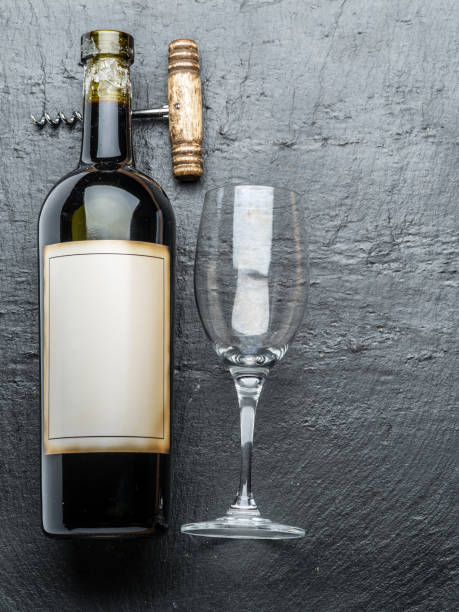 istock Wine bottle, wine glass and corkscrew. 1084461386