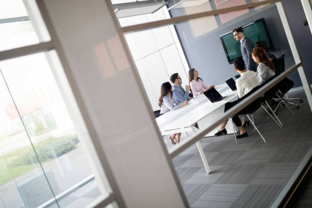 istock Collaboration and analysis by business people working in office 1084461658