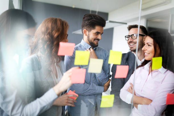 istock Group of business people collaborating in office 1084461926