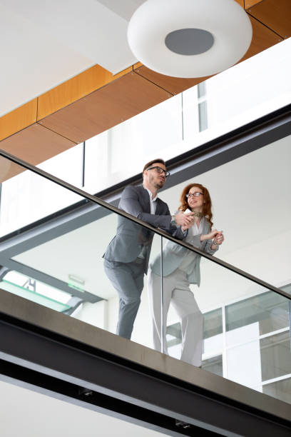 istock Business people having fun in modern office 1084461940