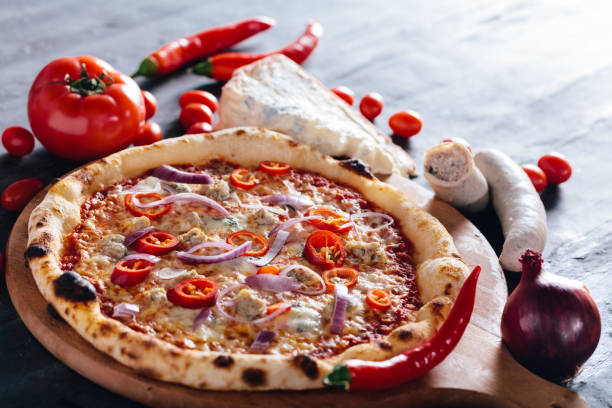 istock Pizza with hot pepper, red onion, sausage and blue cheese 1084462538