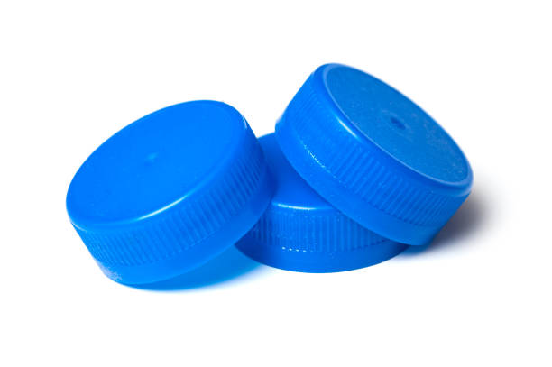 istock blue plastic plugs for recycling on white background 1084463106