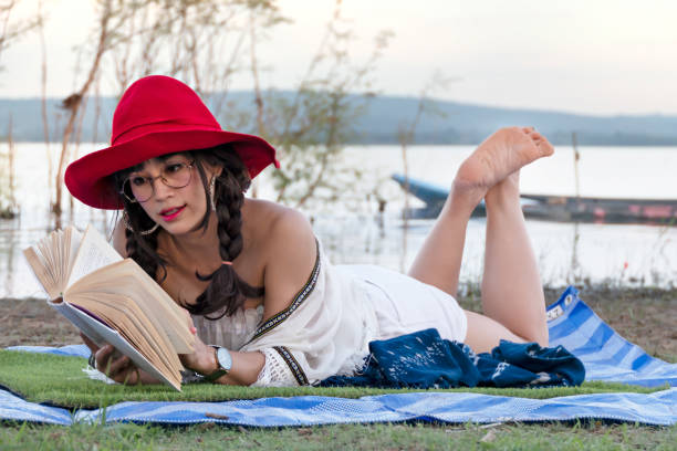 happy senior woman enjoy the day in summer at the lake