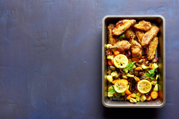 istock Grilled vegetables with chicken wings 1084465572