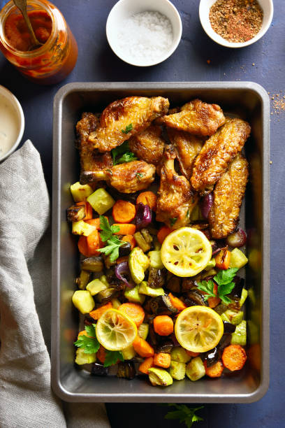 istock Grilled vegetables with chicken wings 1084465584