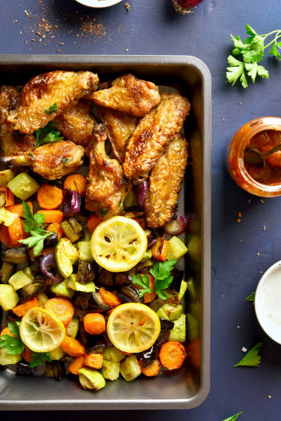 istock Grilled vegetables with chicken wings 1084465586