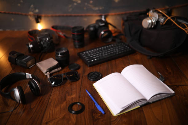 The photographer's desk, digital camera accessories and lenses