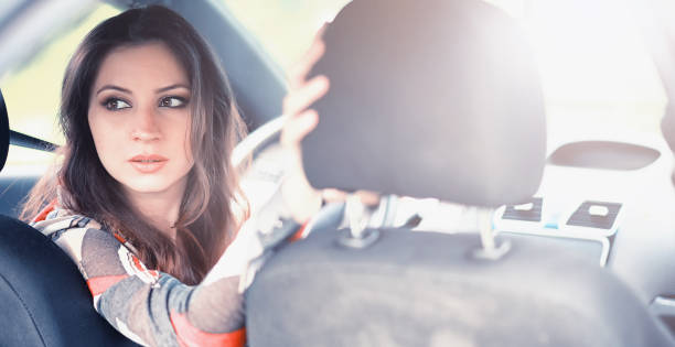 istock Girl driving a car bad emotions 1084467342