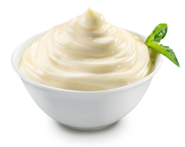 istock Mayonnaise swirl in white bowl. 1084476776