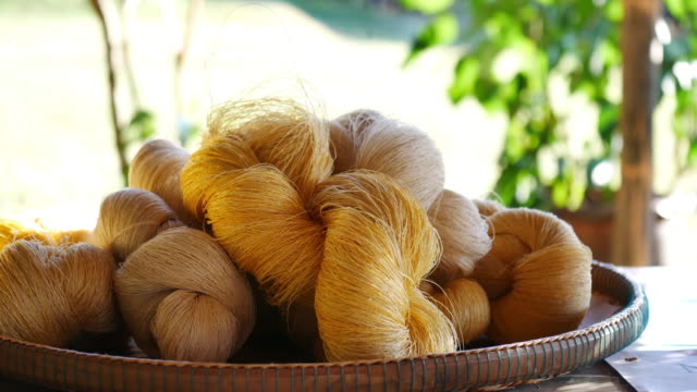 cotton from silkwarm in basket.