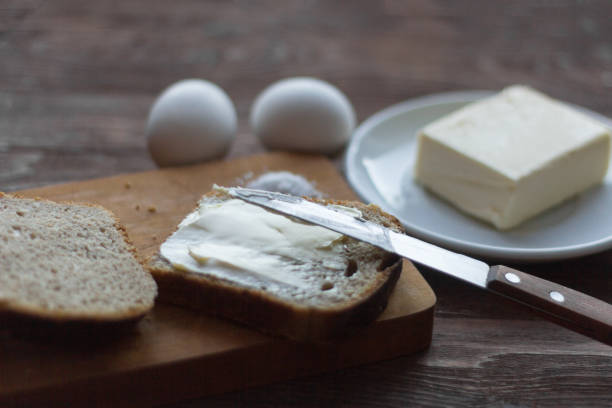 istock rye bread with butter and boiled eggs on the village table 1084479656
