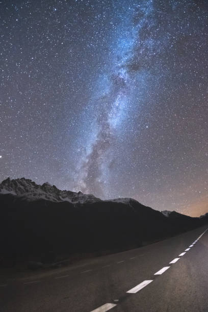 istock night sky with milky way over Dombay mountains 1084482176