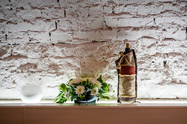 istock beautiful vase with flowers in a restaurant 1084482346