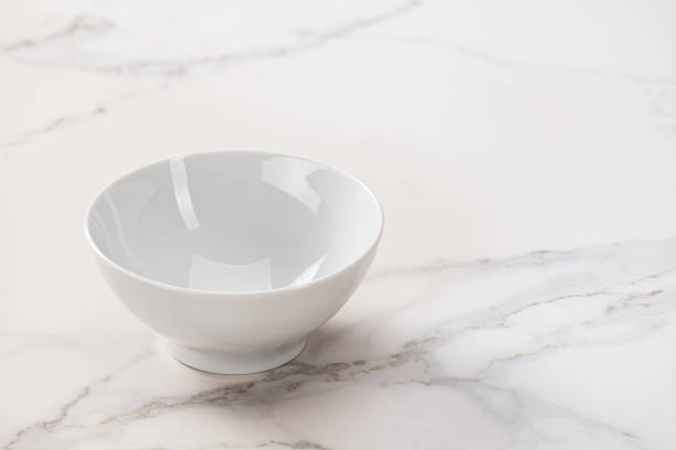 istock White soup bowl on marble kitchen countertop. 1084487784