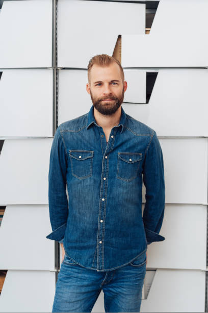 istock Handsome man in blue denim shirt 1084488900