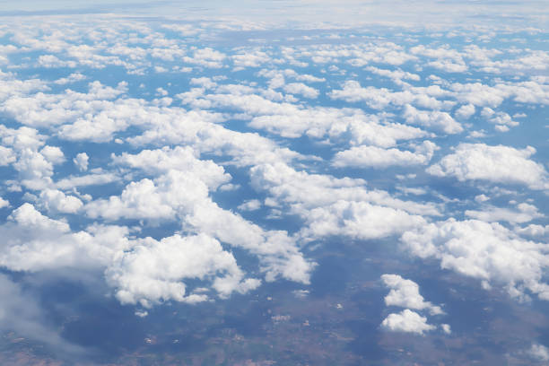 istock Dramatic atmosphere panorama view of beautiful blue sky and soft white clouds from aircraft. 1084490360