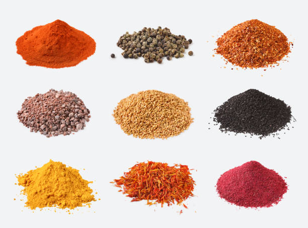 istock Different kinds of spices on white background 1084497600