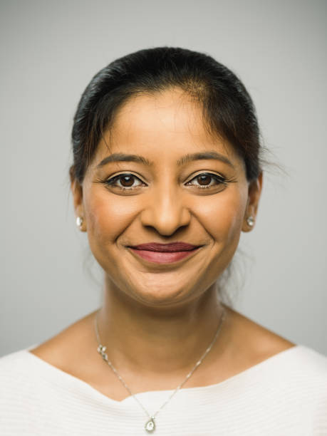 istock Real indian young woman with happy expression 1084497812