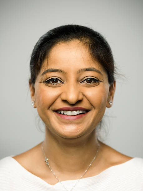 istock Real indian young woman laughing with happy expression 1084497866