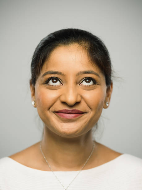 istock Real indian young woman with happy expression 1084497970