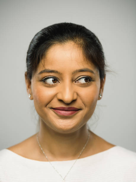 istock Real indian young woman with happy expression 1084498020