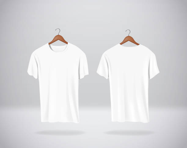istock White T-Shirts Mock-up clothes hanging isolated on wall, blank f 1084498364