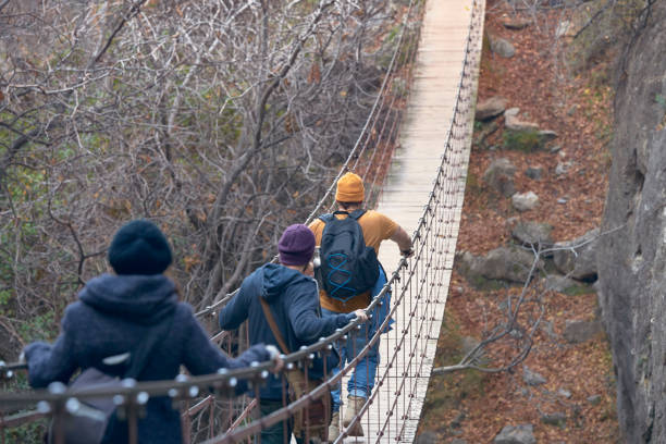 Photograph of the models on the floating bridge of Los Cahorros, Sierra Nevada natural park, Granada, Spain