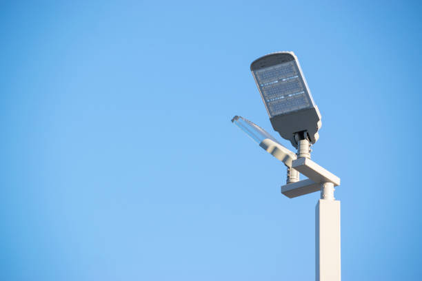 istock Solar panel with lamp under blue sky for energy power concept. 1084506500