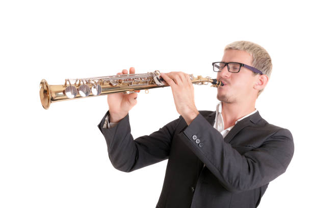 istock musician with soprano saxophone 1084516812