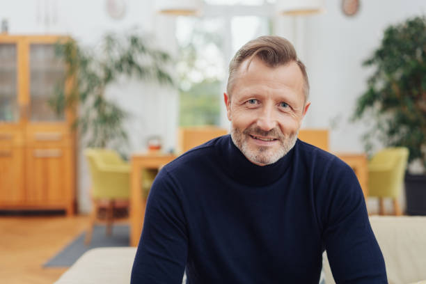 istock Happy, mature, metro man smiling at camera 1084518768