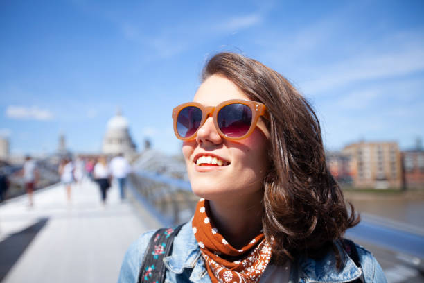 istock Beautiful woman at Millenium bridge 1084521756