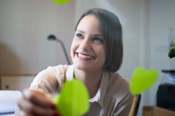 istock Young woman working in her office 1084524986