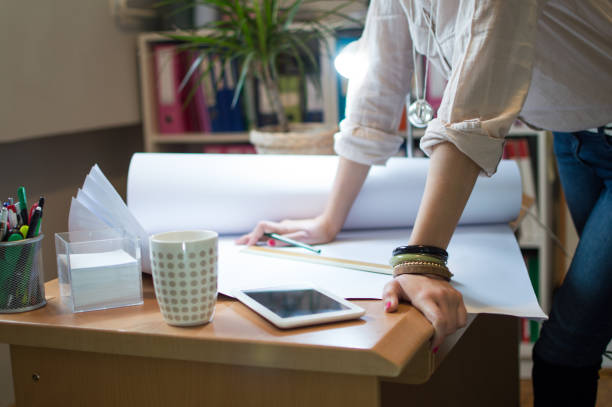 istock Young woman working in her office 1084526174