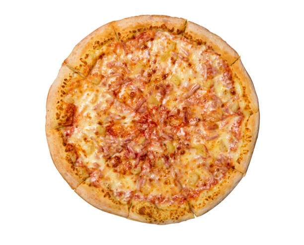 istock Hawaiian Pizza isolated on a white background. Pizza with meat, ham, pepper and pineapple. Top view. 1084526236