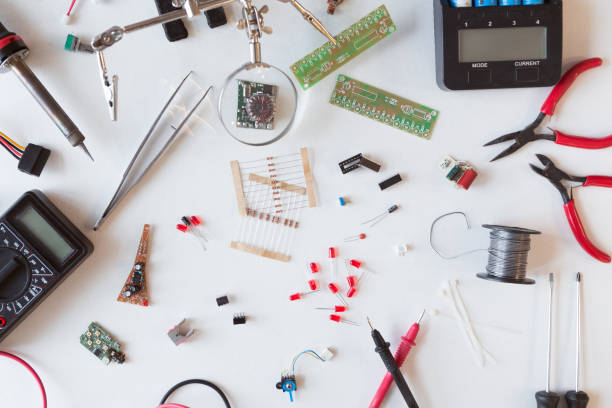 istock Electrician and plumber tools, electrical parts and components with accessories, isolated white background. DIY, do it yourself concept 1084526238